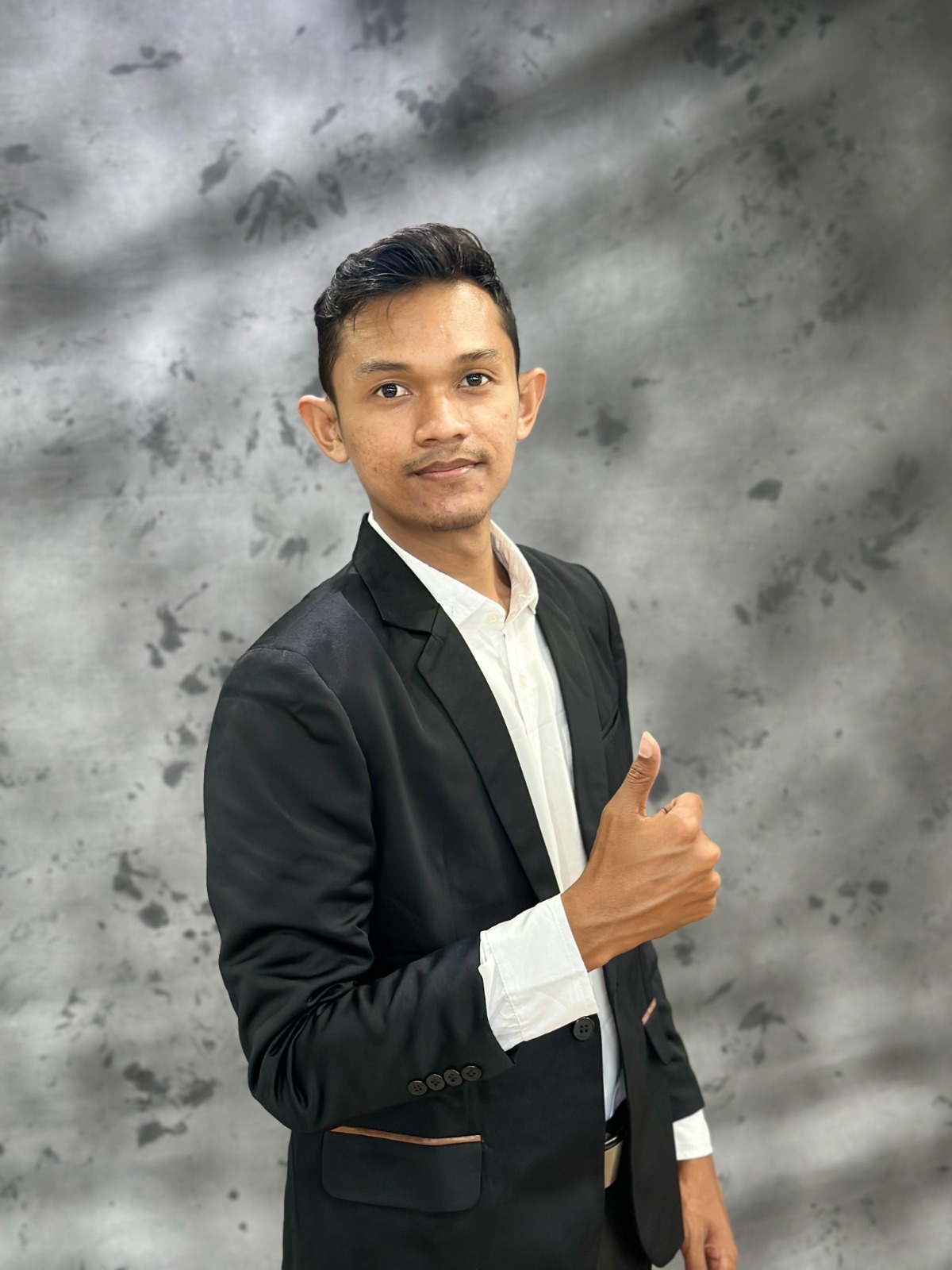 Walid Hasbi, S.Ak., M.Ak